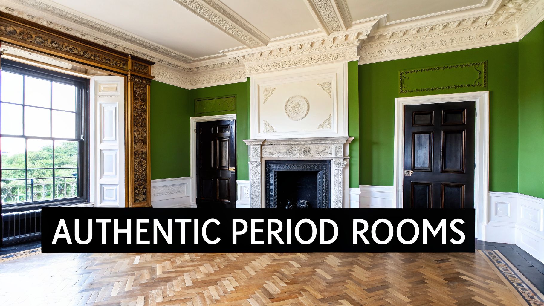 An elegantly restored period room featuring green walls, ornate white molding, a grand fireplace, and polished parquet flooring.