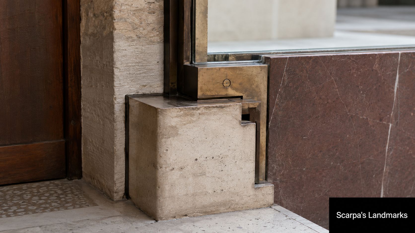 A detailed close-up shot of architectural metal, stone, and wood joinery at a Carlo Scarpa landmark building.