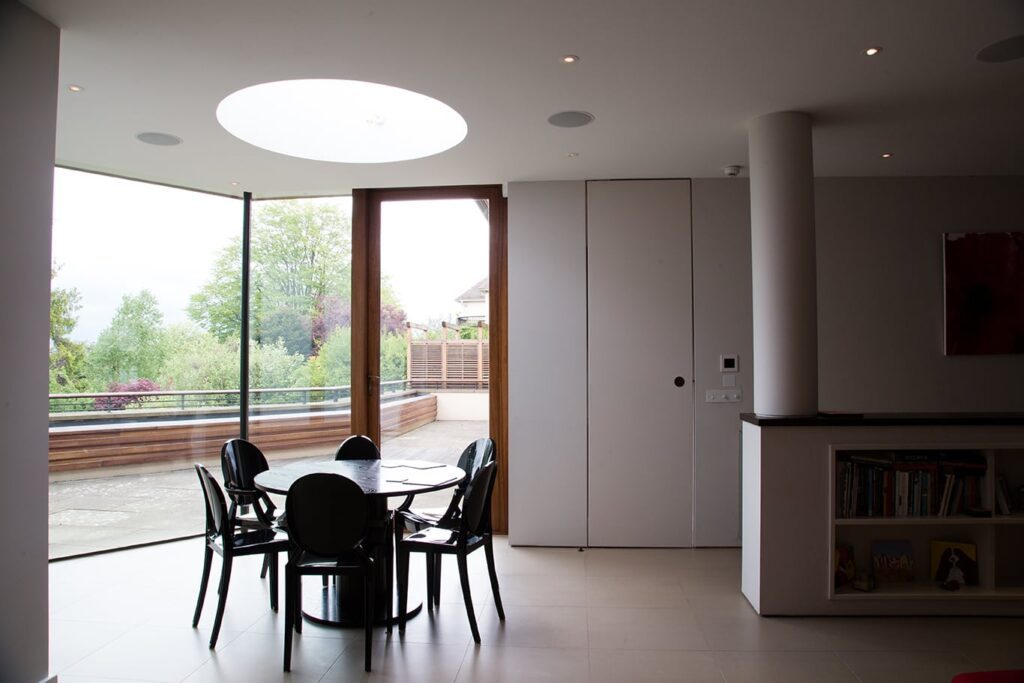 Basement dining space with rooflight