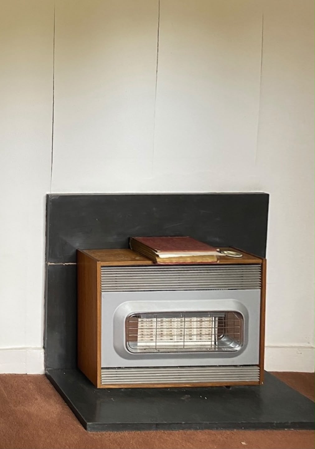 Existing gas fire before the West Side Common renovation
